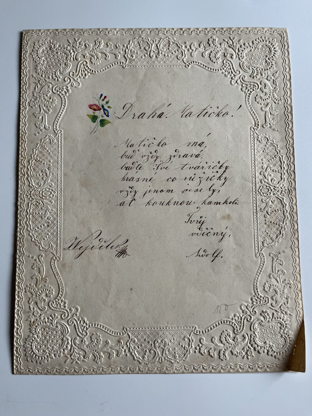 Starožitný dopisní papír zdobený, s tlačeným okrajem, květinou, text